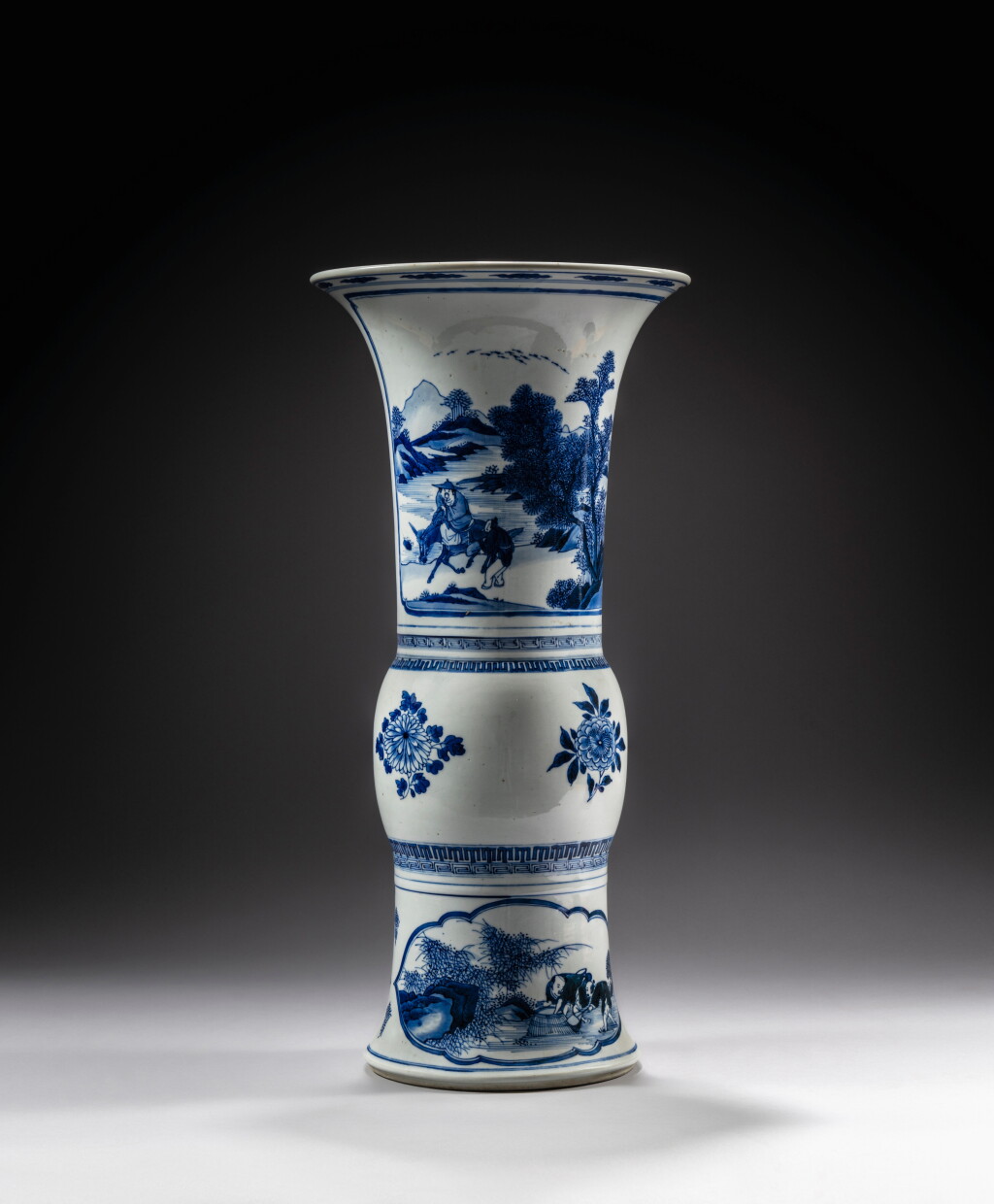 View full screen - View 1 of Lot 375. A large blue and white 'figural' beaker vase (Gu), Qing dynasty, Kangxi period.