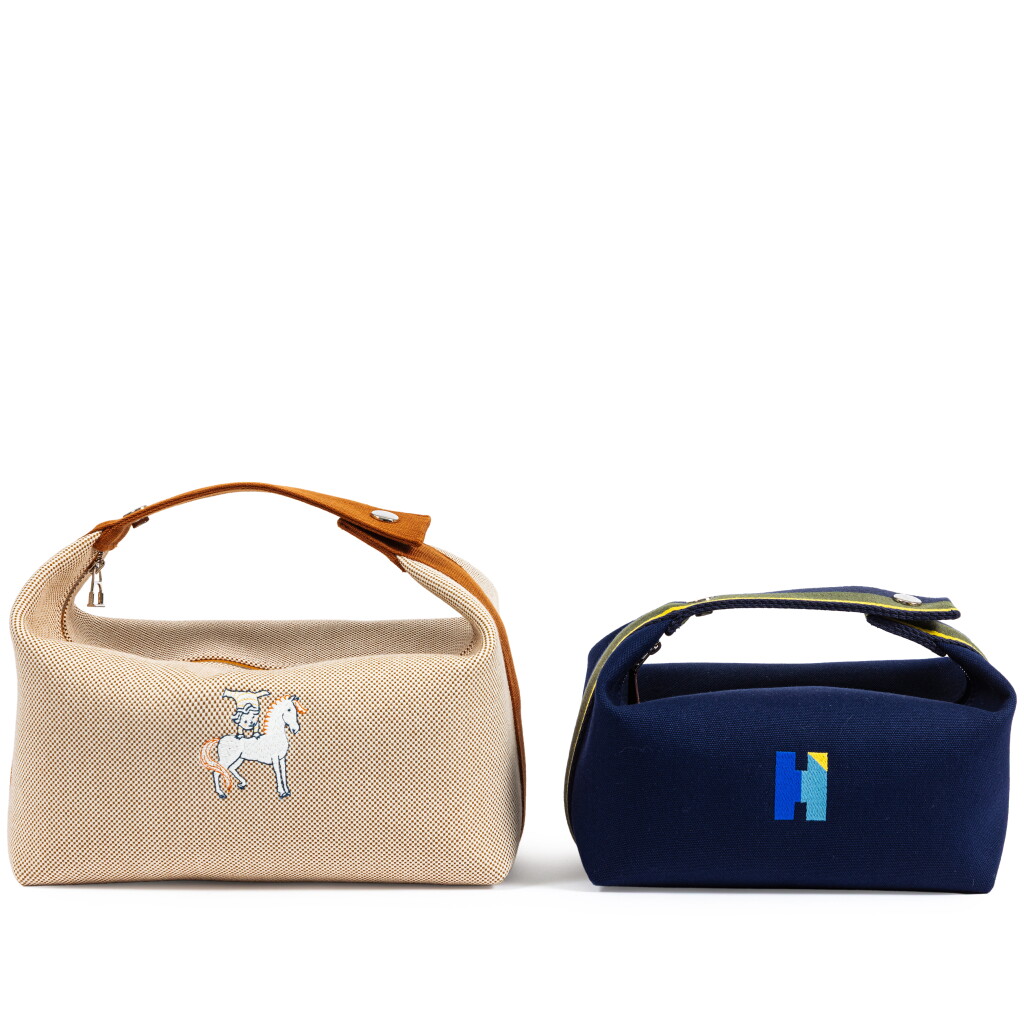 View full screen - View 1 of Lot 777. Set of Two: Naturel Canvas Bride-à-Brac Case GM Palladium Hardware and Navy Canvas Bride-à-Brac Case PM Palladium Hardware.