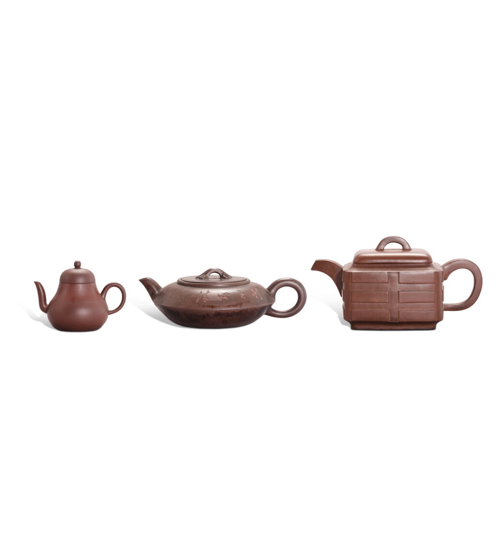 View full screen - View 1 of Lot 3315. Three inscribed Yixing teapots, 19th - 20th century | 十九至二十世紀 宜興紫砂壺三件.