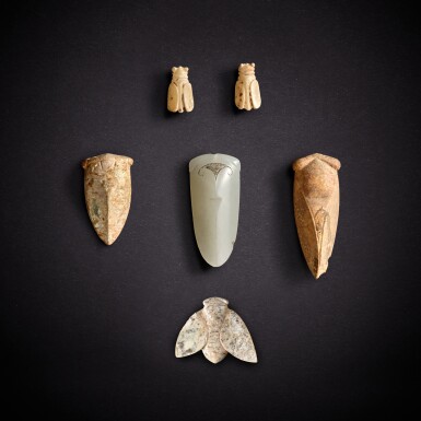 View full screen - View 1 of Lot 7901. Five jade cicadas and a glass cicada, Eastern Zhou dynasty, Warring States period - Han dynasty | 東周戰國至漢 玉蟬五件及琉璃蟬一件.