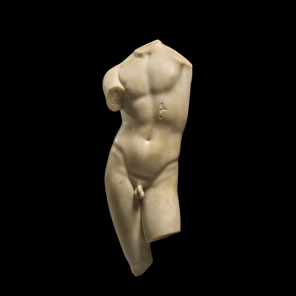 View full screen - View 1 of Lot 34. A ROMAN MARBLE TORSO OF POTHOS (DESIRE), CIRCA 2ND CENTURY A.D..