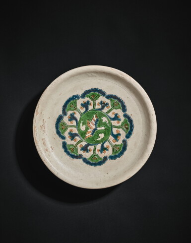 View full screen - View 1 of Lot 2008. A blue and sancai-glazed tripod dish, Tang dynasty | 唐 三彩加藍荷塘飛雁三足盤.