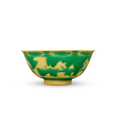 View full screen - View 1 of Lot 1107. A yellow-ground green-enameled 'boys' bowl, Mark and period of Kangxi | 清康熙 黃地綠彩嬰戲圖盌 《大清康熙年製》款.