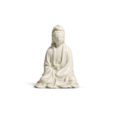 View full screen - View 1 of Lot 13. A small Dehua figure of Guanyin, 17th/18th century | 十七/十八世紀 德化觀音坐像 《张翕》款.