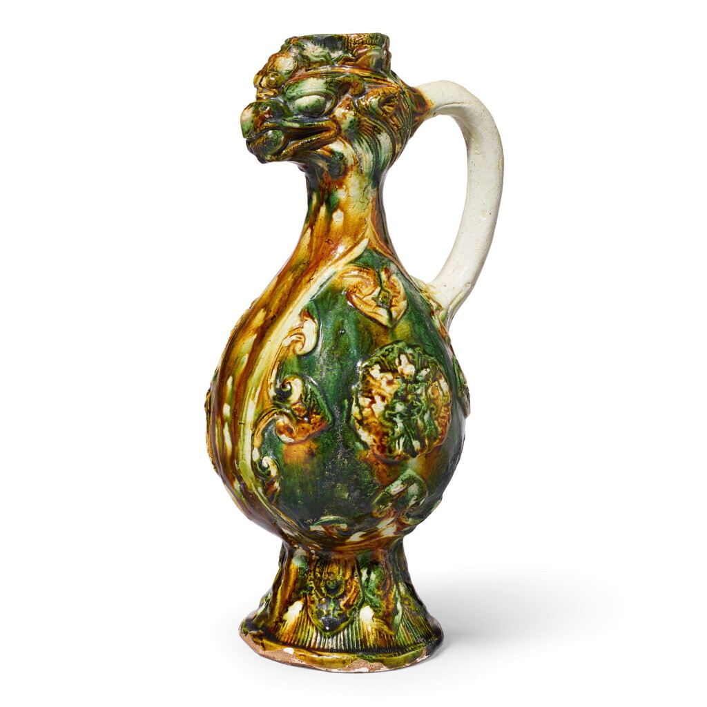 View full screen - View 1 of Lot 3615. A SANCAI-GLAZED PHOENIX-HEADED EWER TANG DYNASTY | 唐 三彩貼花鳳首壺.