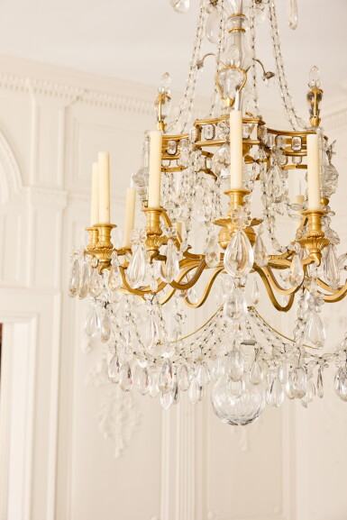 View full screen - View 1 of Lot 678. A gilt-bronze-mounted twelve-light glass chandelier, modern.