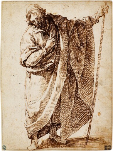 View full screen - View 1 of Lot 75. A standing figure of a man wearing a cloak and holding a stick.