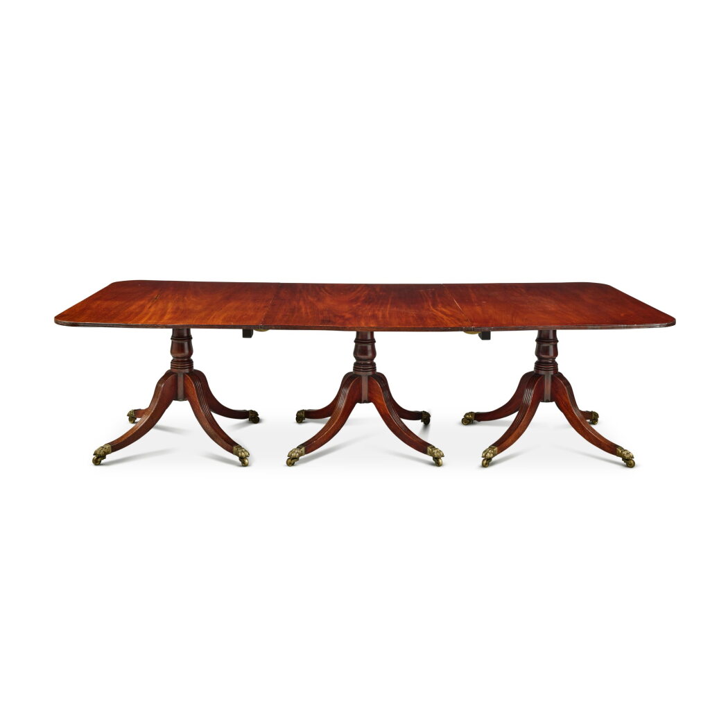View full screen - View 1 of Lot 297. A Late George III Mahogany Three-Pedestal Dining Table, Circa 1800.