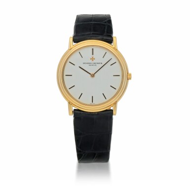 View full screen - View 1 of Lot 922. REF 33221 YELLOW GOLD WRISTWATCH WITH STEPPED BEZEL CIRCA 1989.