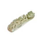 A pale celadon jade 'chilong' belt hook , Qing dynasty, 18th / 19th century | 清十八 / 十九世紀 青白玉雕螭龍紋帶鉤