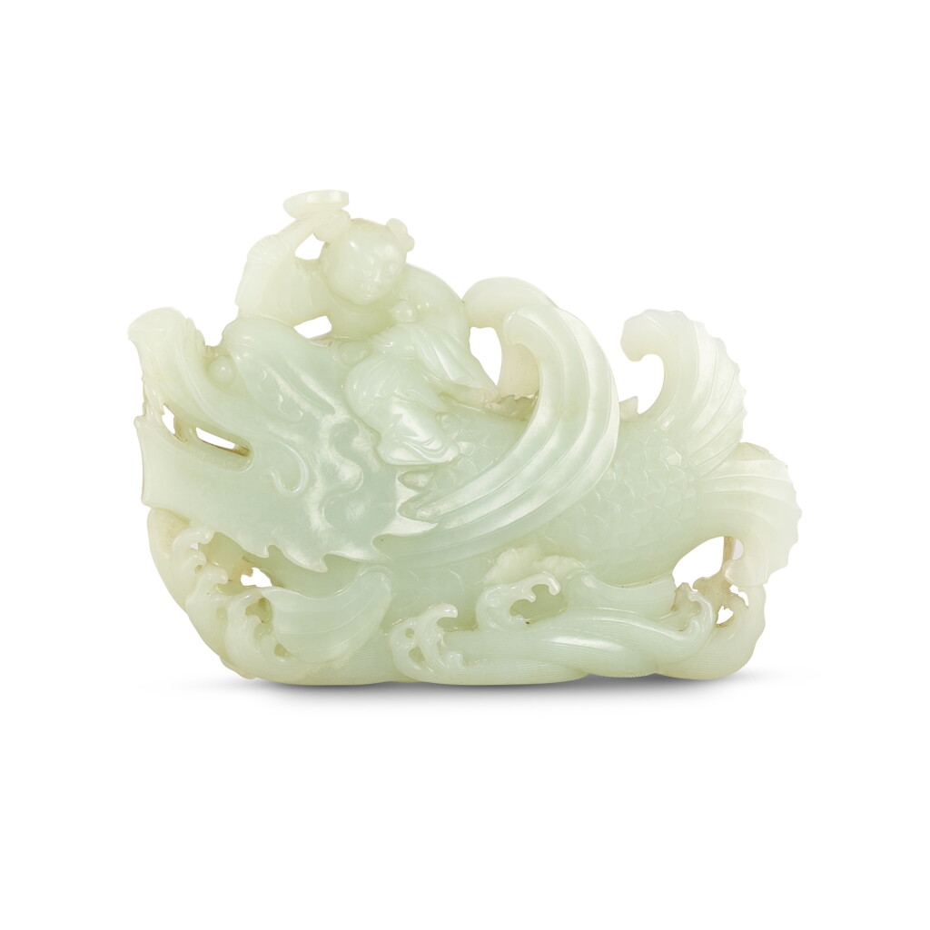 View full screen - View 1 of Lot 311. A celadon jade 'boy on makara' group, Qing dynasty, 19th century 清十九世紀 青白玉鯉躍龍門擺件.