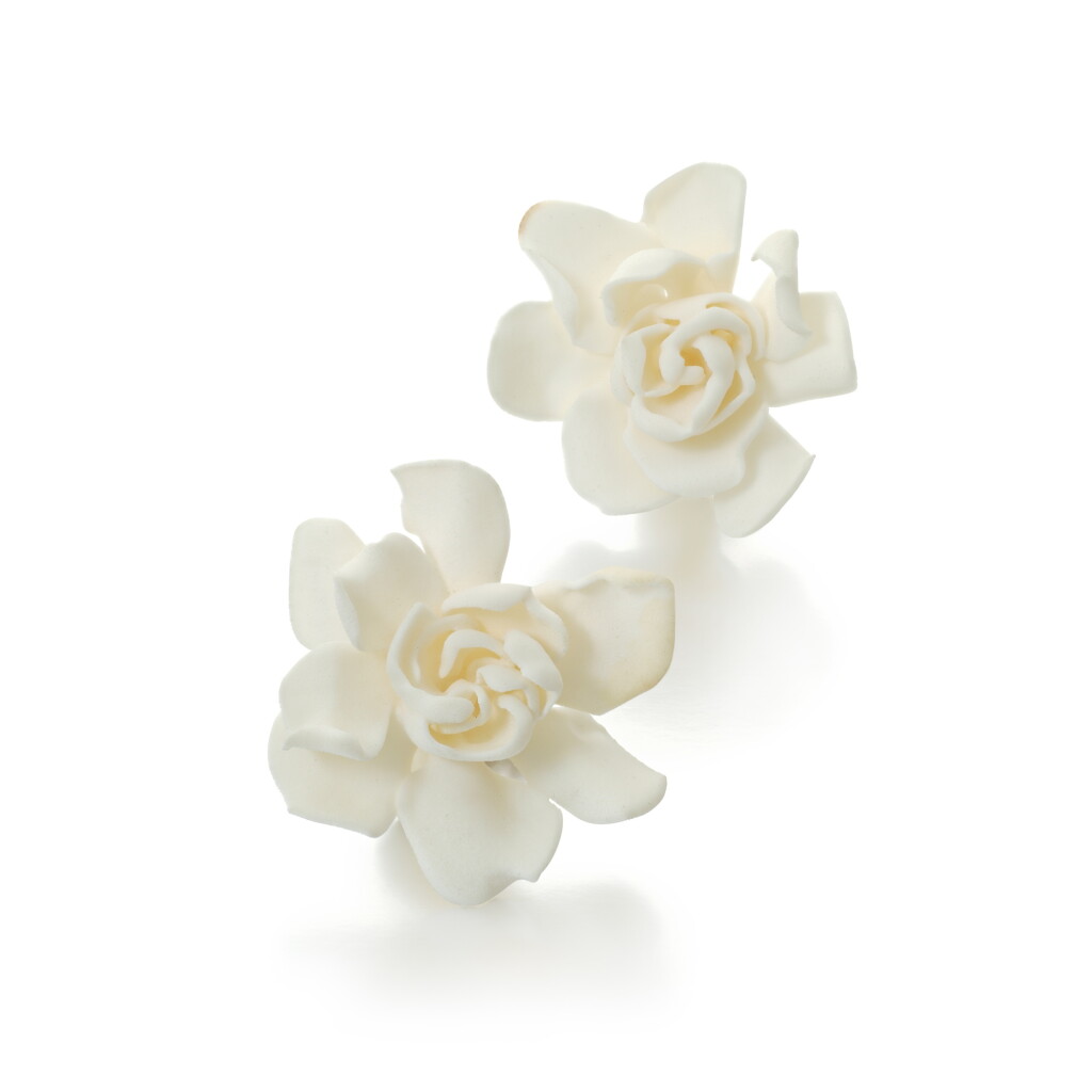 View full screen - View 1 of Lot 767. Pair of resin ear clips, ‘Gardenia’.