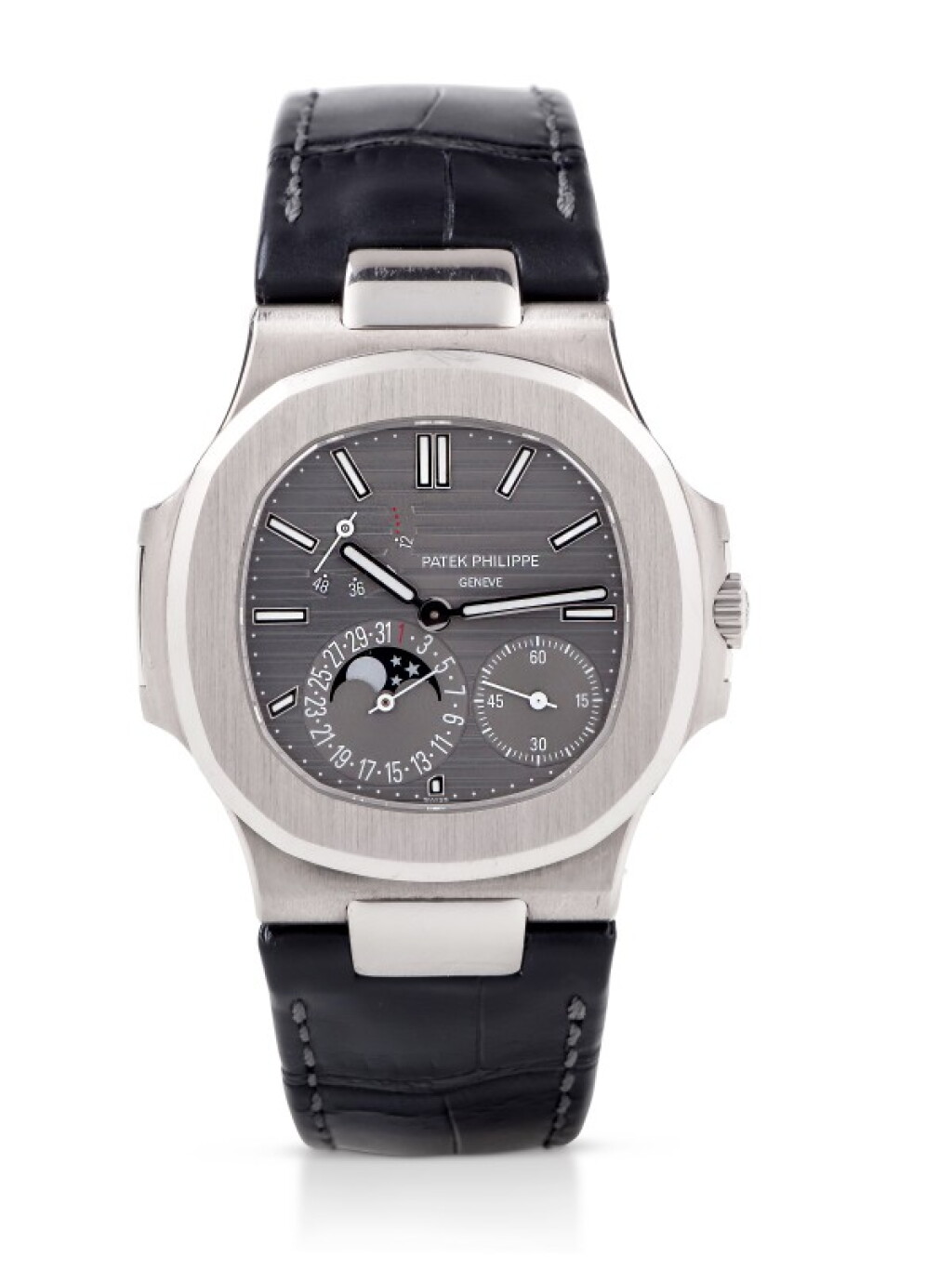 View full screen - View 1 of Lot 8. PATEK PHILLIPE | NAUTILUS, REF 5712 WHITE GOLD WRISTWATCH WITH DATE, MOON PHASES AND POWER RESERVE INDICATION CIRCA 2016.