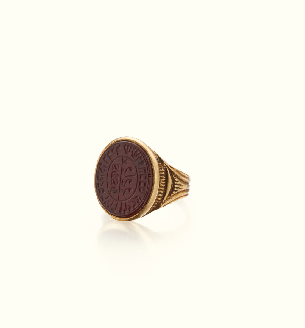 View full screen - View 1 of Lot 65. A GOLD AND CARNELIAN SIGNET RING OF DAVID SOLOMON SASSOON, LATE 19TH CENTURY.