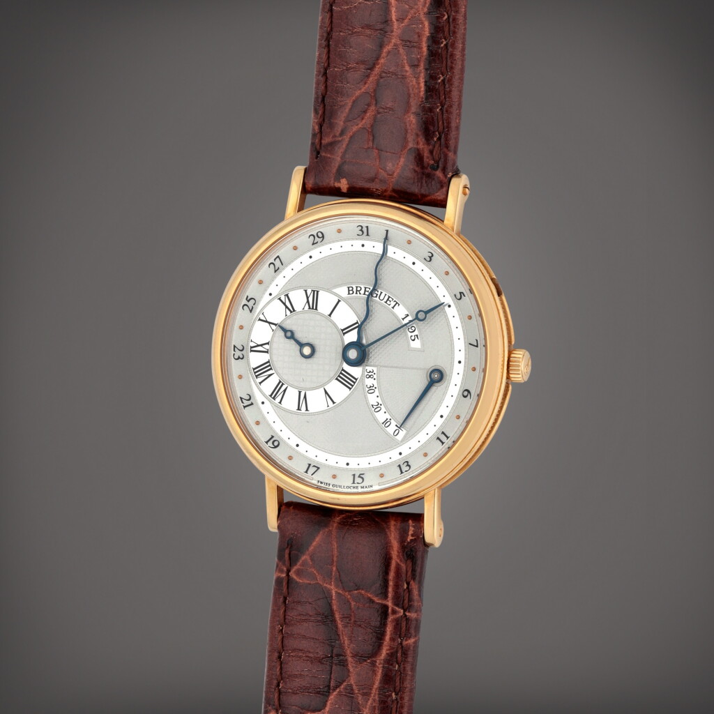 View full screen - View 1 of Lot 307. Reference 3680BA/11/986 | A yellow gold regulator wristwatch with date and power reserve indication | Circa 2003.