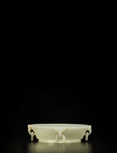 View full screen - View 1 of Lot 174. A rare archaistic white jade handled washer, Qing dynasty, Qianlong period.