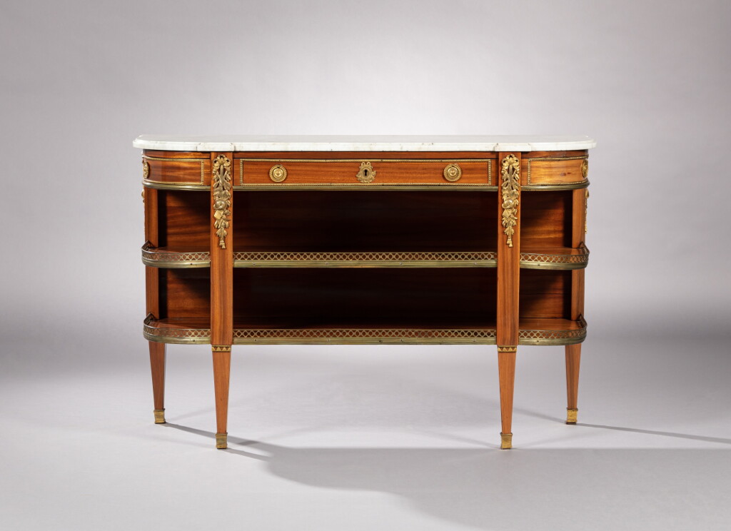 View full screen - View 1 of Lot 85. A Louis XVI satinwood with gilt-bronze mounts console desserte, circa 1780, stamped Charles Topino | Console en satiné, monture de bronze doré d'époque Louis XVI, vers 1780, estampille de Charles Topino.