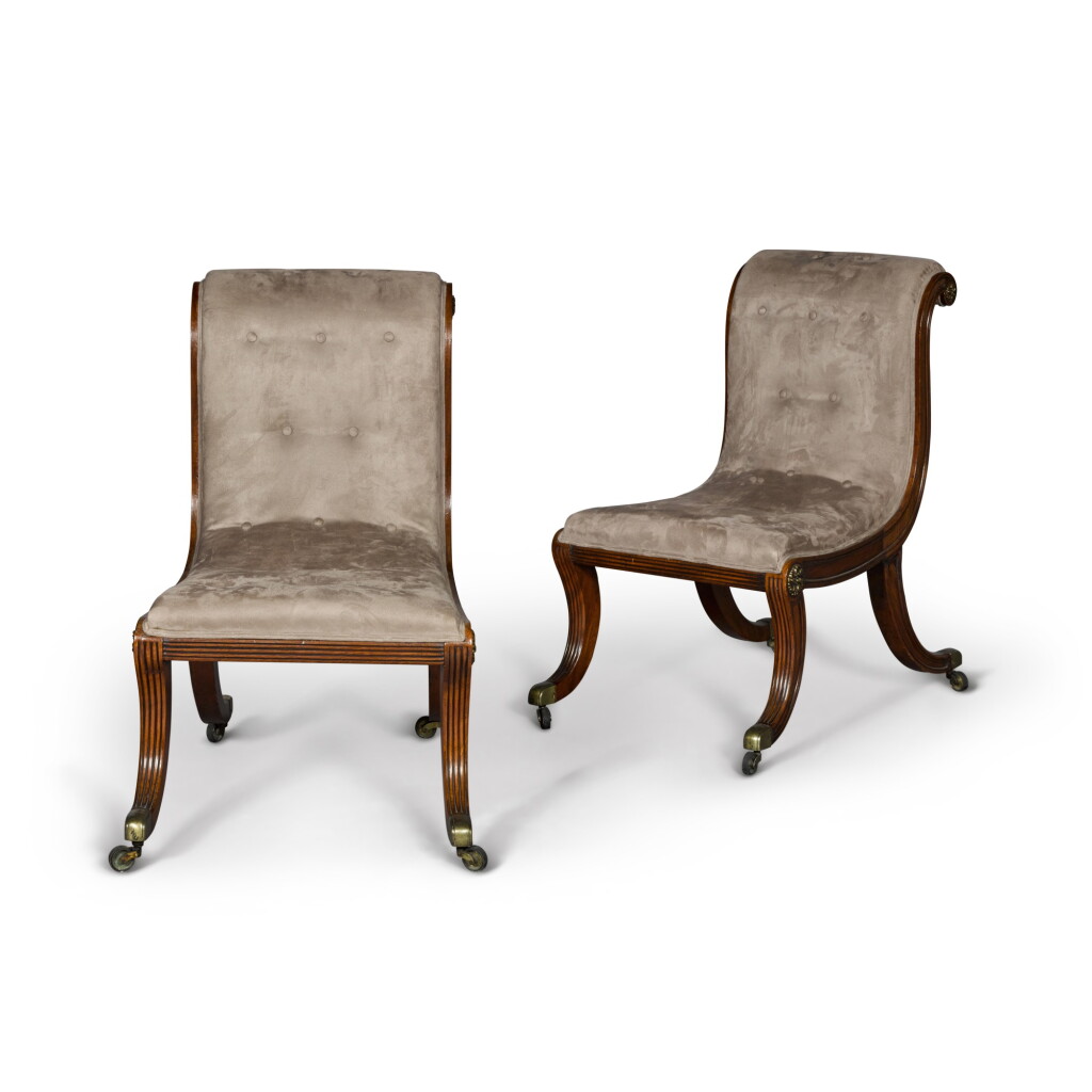 View full screen - View 1 of Lot 53. A pair of Regency gilt-brass mounted mahogany side chairs, circa 1810, after a design by Thomas Hope.