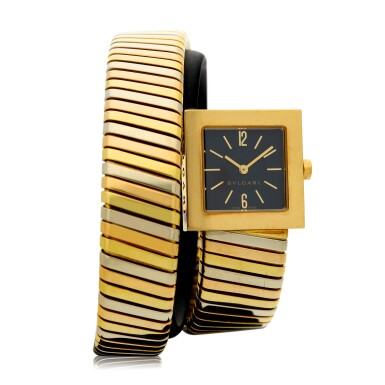 View full screen - View 1 of Lot 53. BULGARI | SERPENTI A TRICOLOR GOLD CUFF WATCH WITH SQUARE DIAL, CIRCA 2010.