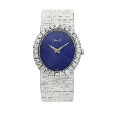 View full screen - View 1 of Lot 98. Reference 9814 A 6 A white gold and diamond-set bracelet watch with lapis lazuli dial, Circa 1976.