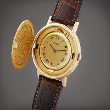 View full screen - View 1 of Lot 477. Montre bracelet en or jaune pièce de vingt dollars | Yellow gold twenty dollars coin bracelet watch Vers 1990 | Circa 1990.