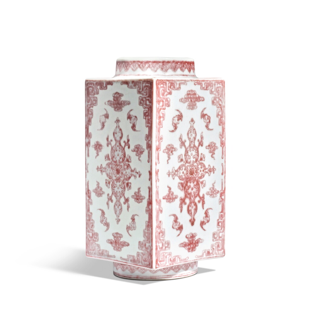 View full screen - View 1 of Lot 517. A copper-red 'bats' cong-form vase, Seal mark and period of Qianlong | 清乾隆 釉裏紅福祿紋琮式瓶 《大清乾隆年製》款.