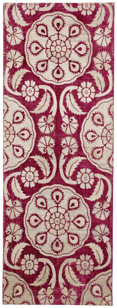View full screen - View 1 of Lot 165. AN OTTOMAN VOIDED SILK VELVET METAL-THREAD (CATMA) PANEL WITH STYLISED PEACOCK FEATHERS, CARNATIONS AND ROSETTES, TURKEY, BURSA OR ISTANBUL, EARLY 17TH CENTURY.