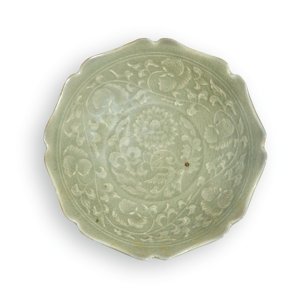 View full screen - View 1 of Lot 85. A 'YAOZHOU' CELADON FOLIATE-SHAPED DISH, YUAN/EARLY MING DYNASTY | 元/明初 耀州窰青釉花式盤.