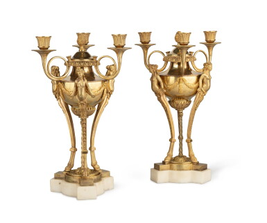 View full screen - View 1 of Lot 81. A pair of gilt-bronze and white marble cassolettes forming candelabra, probably Russian, late 18th century | Paire de cassolettes candélabres en bronze doré et marbre blanc, travail probablement russe, fin du XVIIIe siècle.