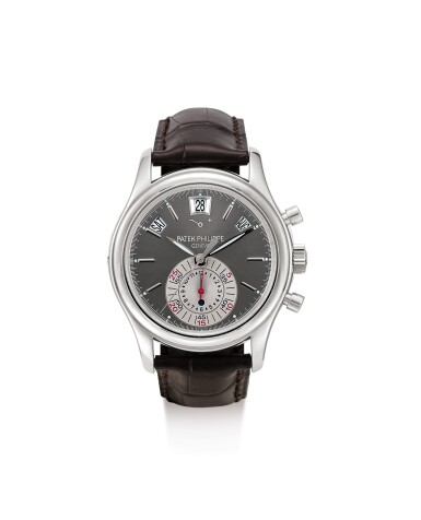 View full screen - View 1 of Lot 30. PATEK PHILIPPE | REFERENCE 5960, A BRAND NEW PLATINUM ANNUAL CALENDAR FLYBACK CHRONOGRAPH WRISTWATCH WITH POWER RESERVE AND DAY AND NIGHT INDICATION, CIRCA 2007.