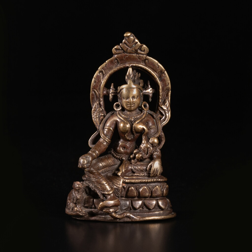 View full screen - View 1 of Lot 607. A copper alloy figure of Hariti, India, Pala period, circa 12th century.