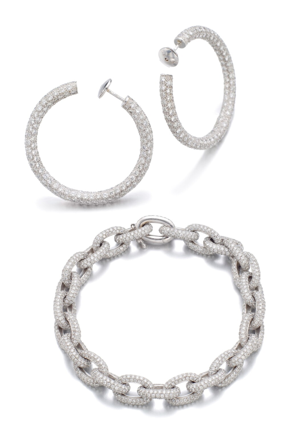 View full screen - View 1 of Lot 13. DIAMOND BRACELET AND A PAIR OF EARRINGS.