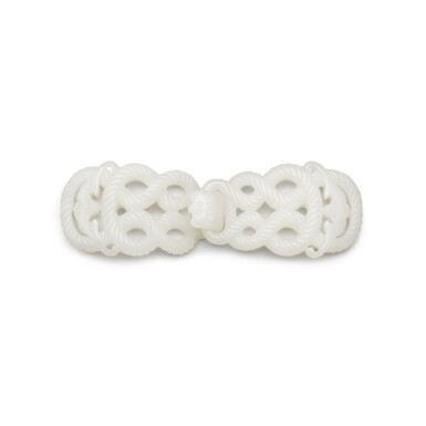 View full screen - View 1 of Lot 42. A white jade belt buckle, Qing dynasty, 18th century | 清十八世紀 白玉索紋帶扣.