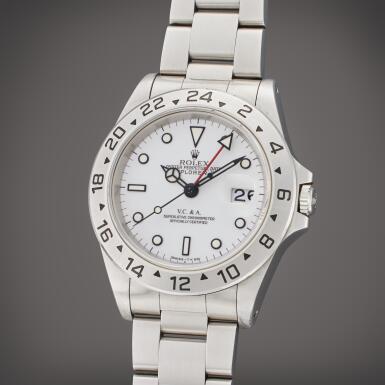 View full screen - View 1 of Lot 109. Reference 16570 Explorer II | Retailed by Van Cleef & Arpels: A stainless steel automatic dual time wristwatch with date and bracelet, Circa 1995.