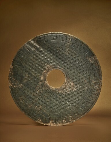View full screen - View 1 of Lot 87. A large green jade 'dragon' disc (Bi), Western Han dynasty .