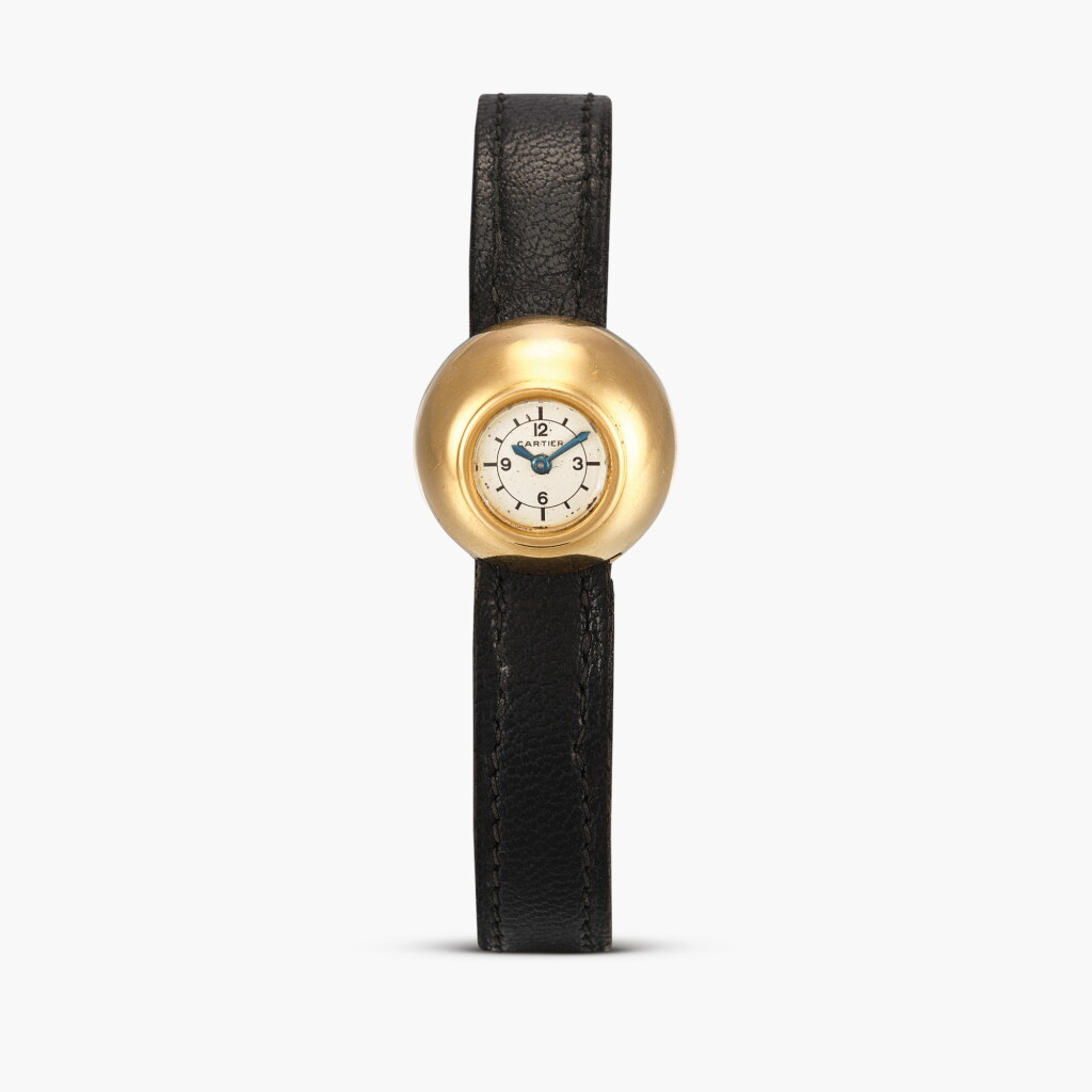 View full screen - View 1 of Lot 2406. The Jerry Lee Lewis ‘Bubble’ | A rare and unusual asymmetrically domed yellow gold bubble-form wristwatch, formerly the property of American comedian and actor Jerry Lewis, Circa 1955-56.