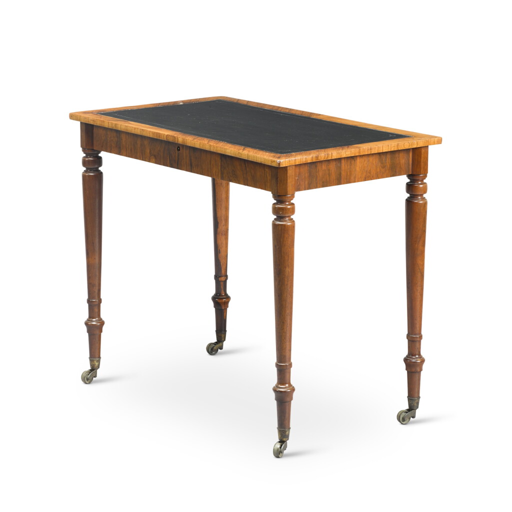 View full screen - View 1 of Lot 75. An early Victorian rosewood writing table, circa 1850.