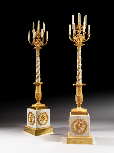 View full screen - View 1 of Lot 23. A pair of large Restauration thirteen-light gilt-bronze and white veined marble porte torchères circa 1815-1820.