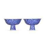 A very rare pair of blue and white 'dragon' stem bowls, Qing dynasty, Qianlong period