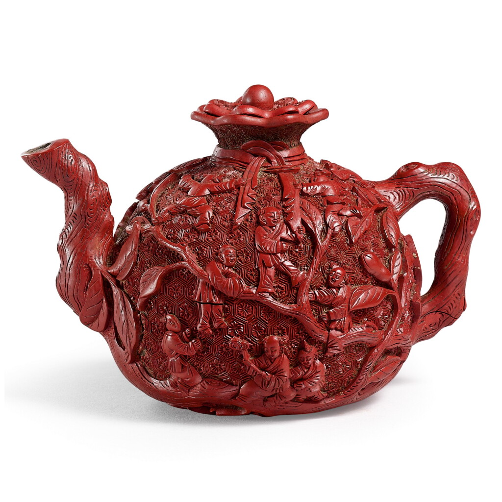 Voir en plein écran - Voir 1 du lot 3662. A RARE CINNABAR LACQUERED YIXING 'BOYS' TEAPOT AND COVER QING DYNASTY, QIANLONG PERIOD | 清乾隆 紫砂剔紅榴開百子蓋壺.