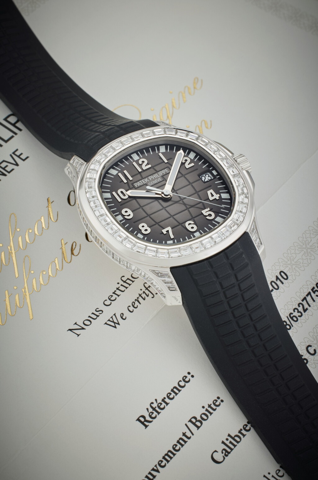 View full screen - View 1 of Lot 49. Reference 5167/300G-010 Aquanaut | A white gold and diamond-set automatic wristwatch with date, Circa 2021.