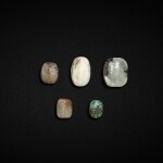 Five jade and turquoise 'turtle's shell' pendants, Western Zhou dynasty and later | 西周及更晚 青玉龜甲墜四件及松石龜甲墜一件