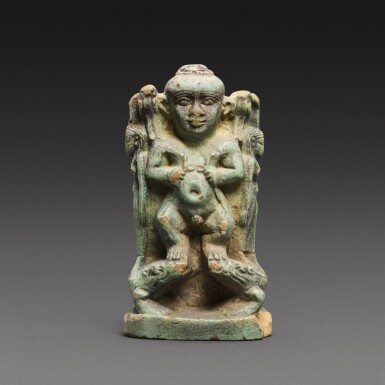 View full screen - View 1 of Lot 69. An Egyptian Faience Amulet of Pataek, Ptolemaic Period, 304-30 B.C..