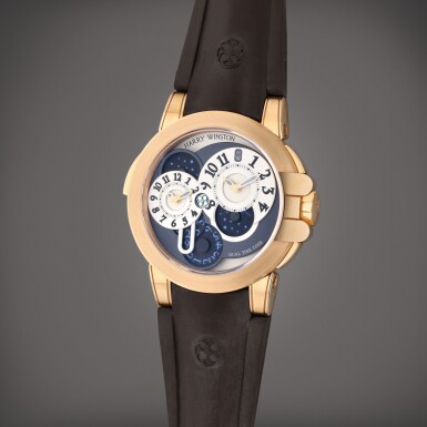 View full screen - View 1 of Lot 300. Reference 400-MATZ44R Ocean Dual Time | A pink gold automatic dual time wristwatch with date and moon phases, Circa 2010.