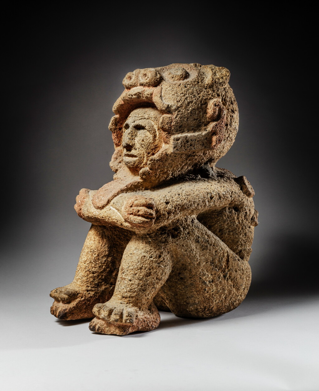 View full screen - View 1 of Lot 19. Stone Figure in Animal Skin.