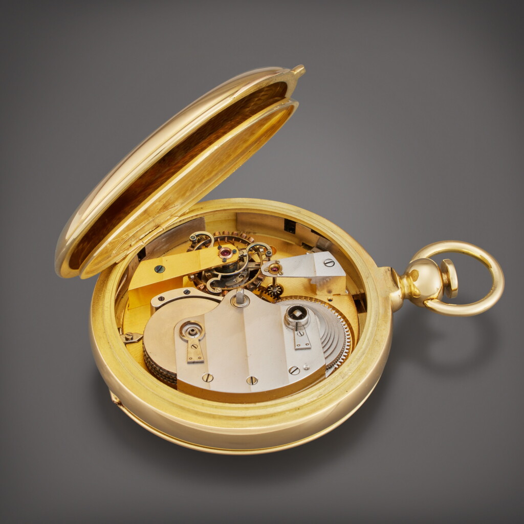 View full screen - View 1 of Lot 479. A keywind one-minute tourbillon movement in a later custom gold hunting case.