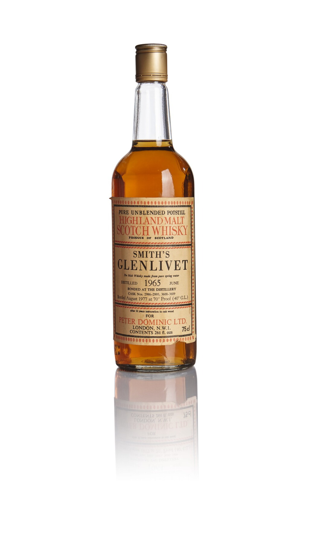 View full screen - View 1 of Lot 199. SMITH’S GLENLIVET BOTTLED FOR PETER DOMINIC 12 YEAR OLD 40.0 ABV 1965.