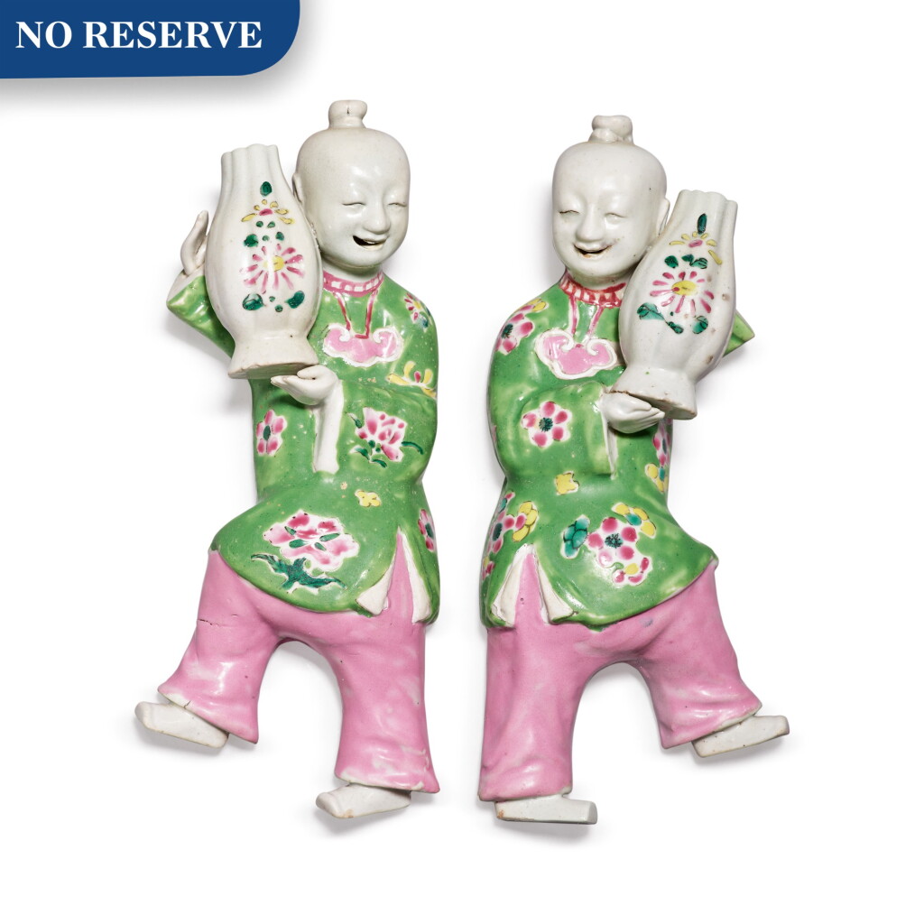 View full screen - View 1 of Lot 473. A Pair of Chinese Export Famille-rose 'Boys' Wall Vases, Qing Dynasty, 18th Century | 清十八世紀 粉彩童子形壁瓶一對.