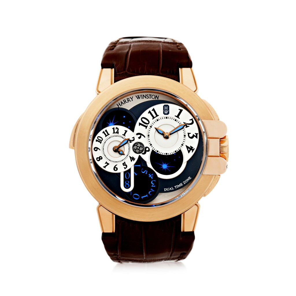 View full screen - View 1 of Lot 303. HARRY WINSTON | REFERENCE 400-MATZ44R A PINK GOLD AUTOMATIC DUAL TIME WRISTWATCH WITH DATE, CIRCA 2009.