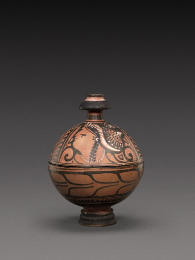 View full screen - View 1 of Lot 54. An Apulian red-figured Globular Pyxis, circa 350-330 B.C..
